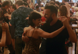Couple dancing tango in a milonga