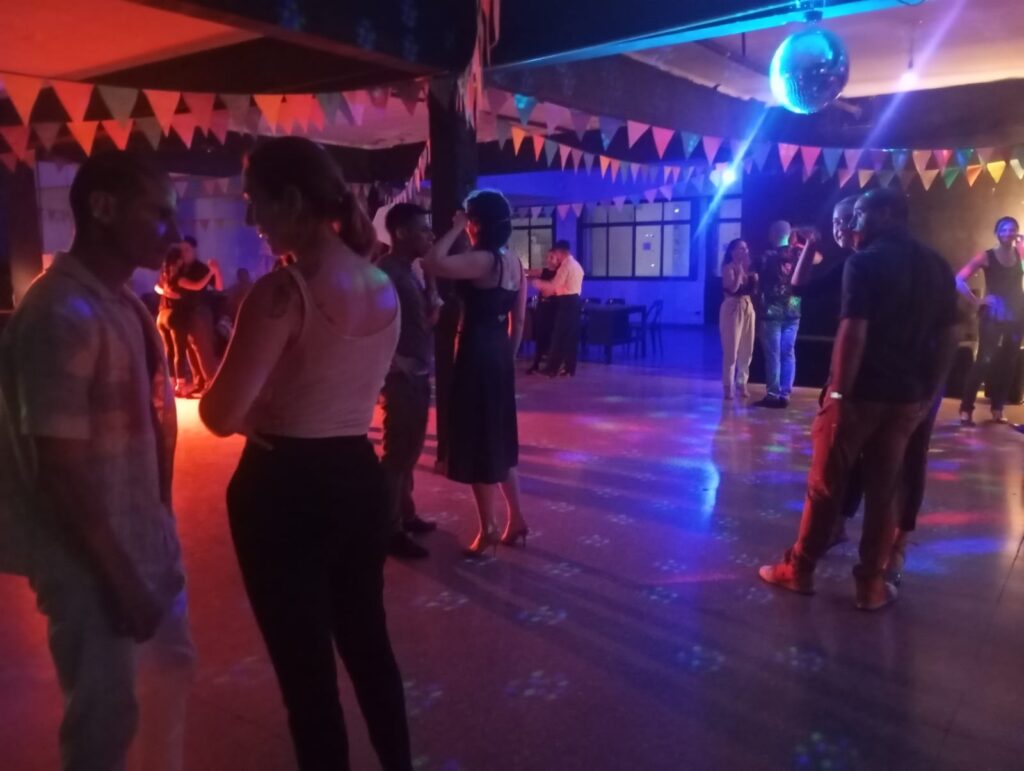 Woman and man conversating milonga tango